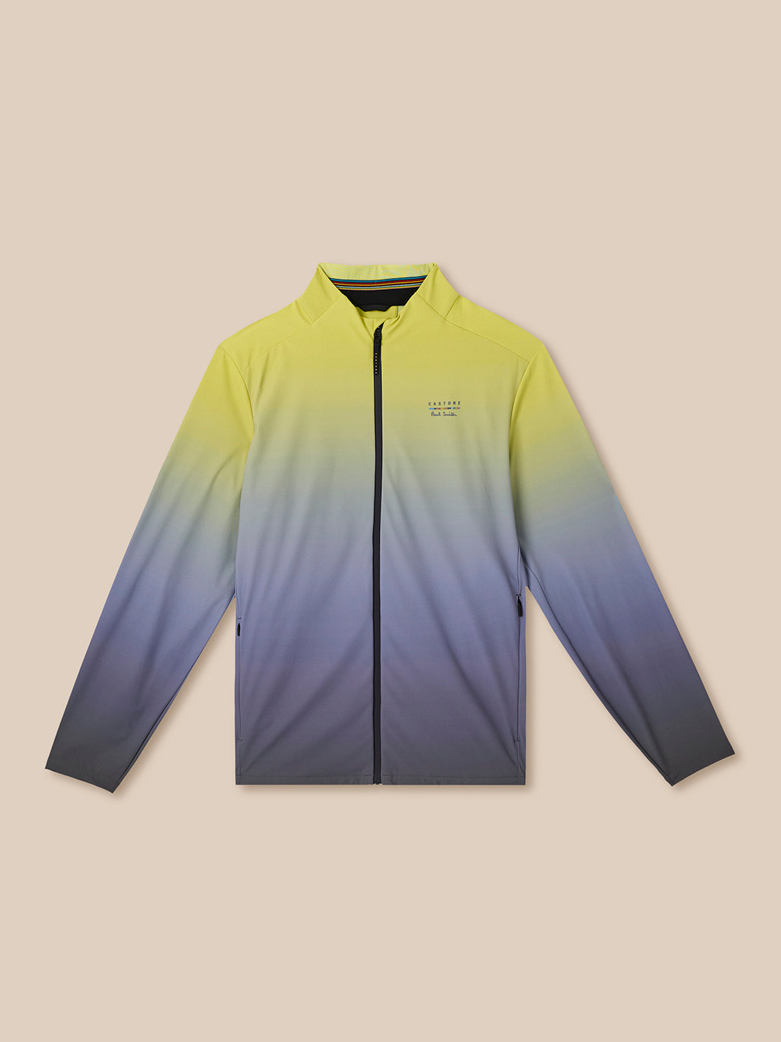 Gradient jacket with yellow to blue color change on a beige background