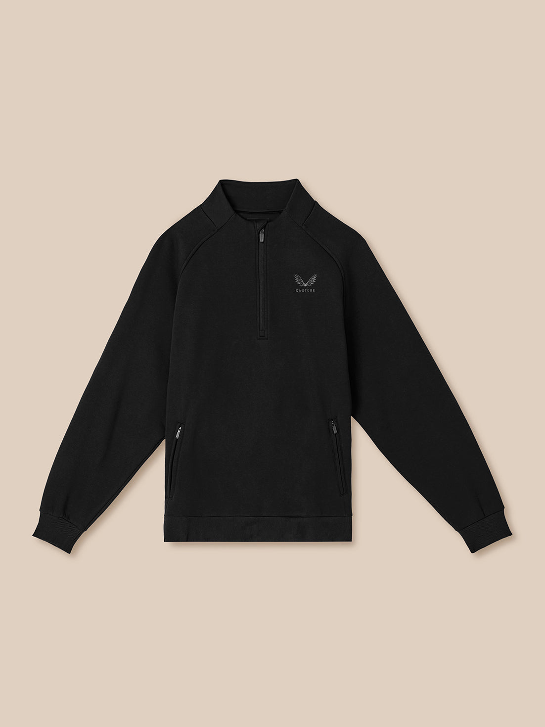Black quarter-zip sweatshirt on a beige background