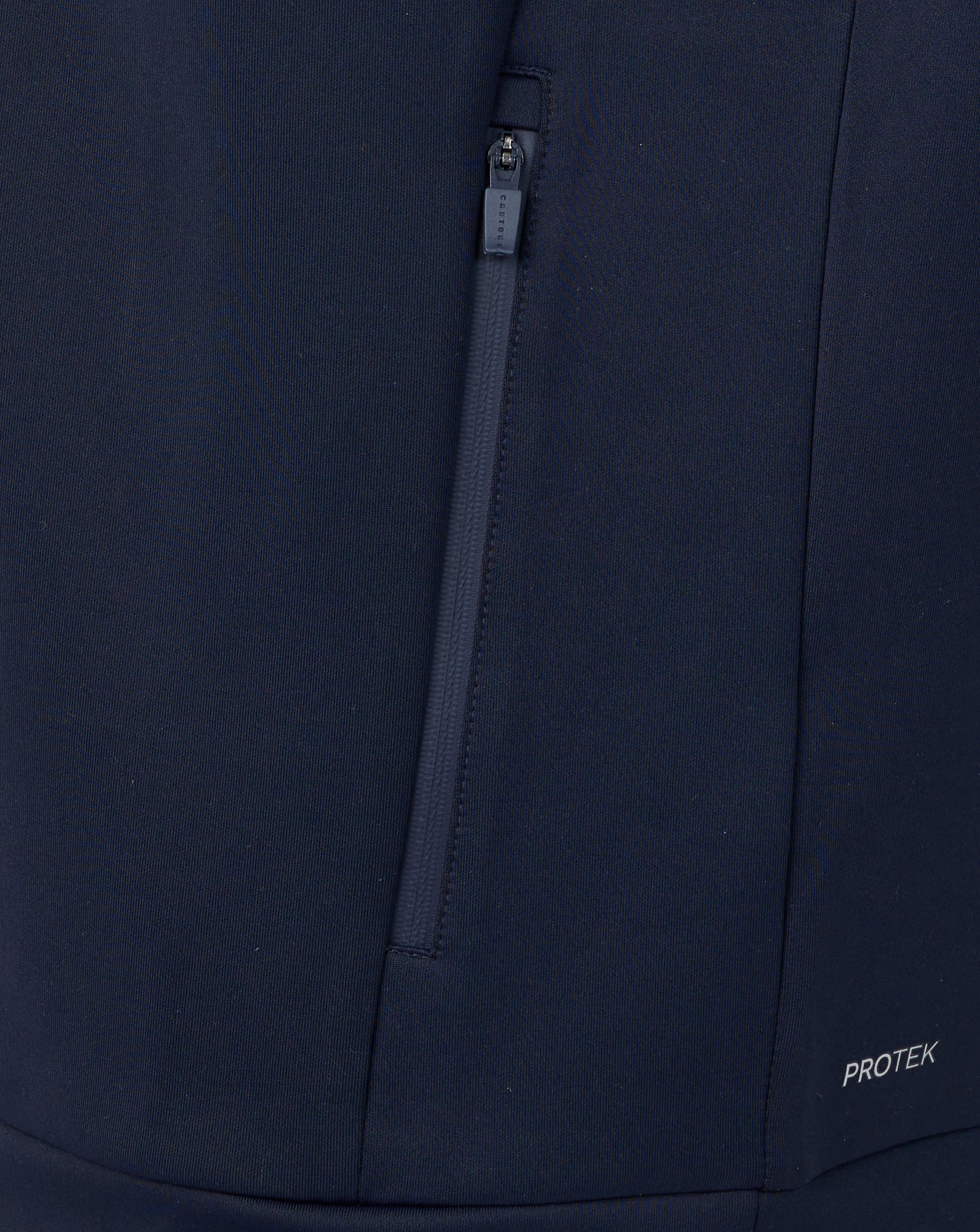 Navy blue jacket with a zipper and 'PROTEK' branding on a matching background