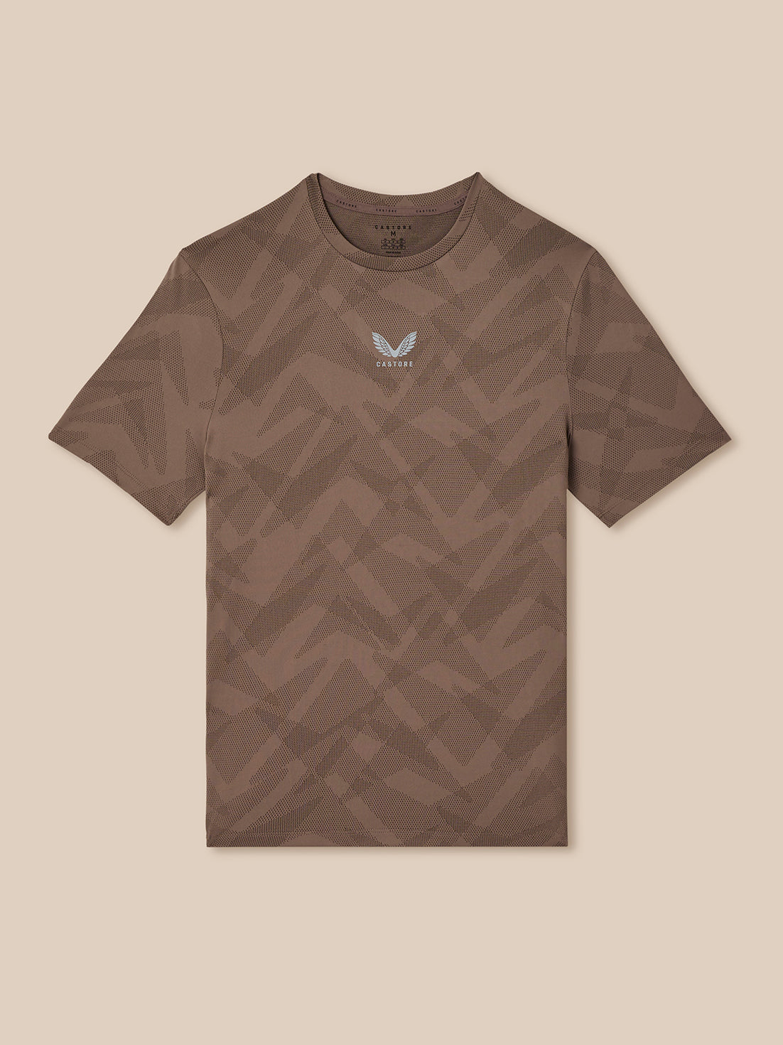 Brown t-shirt with geometric pattern on a beige background