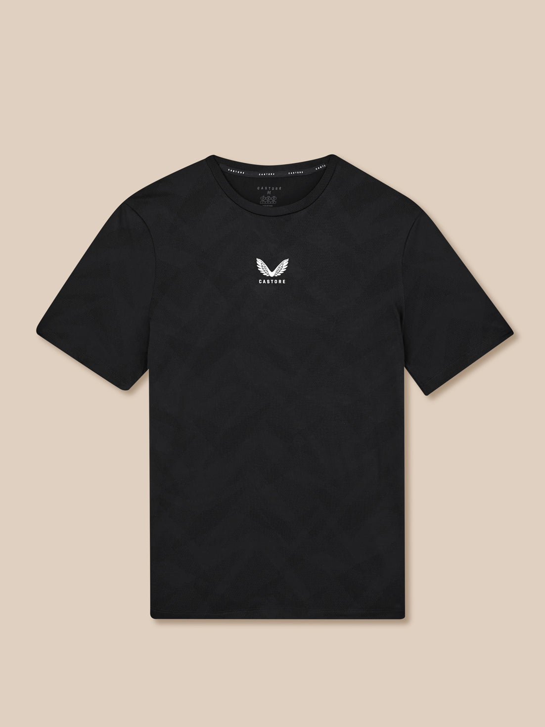 Black t-shirt with a white logo on a beige background