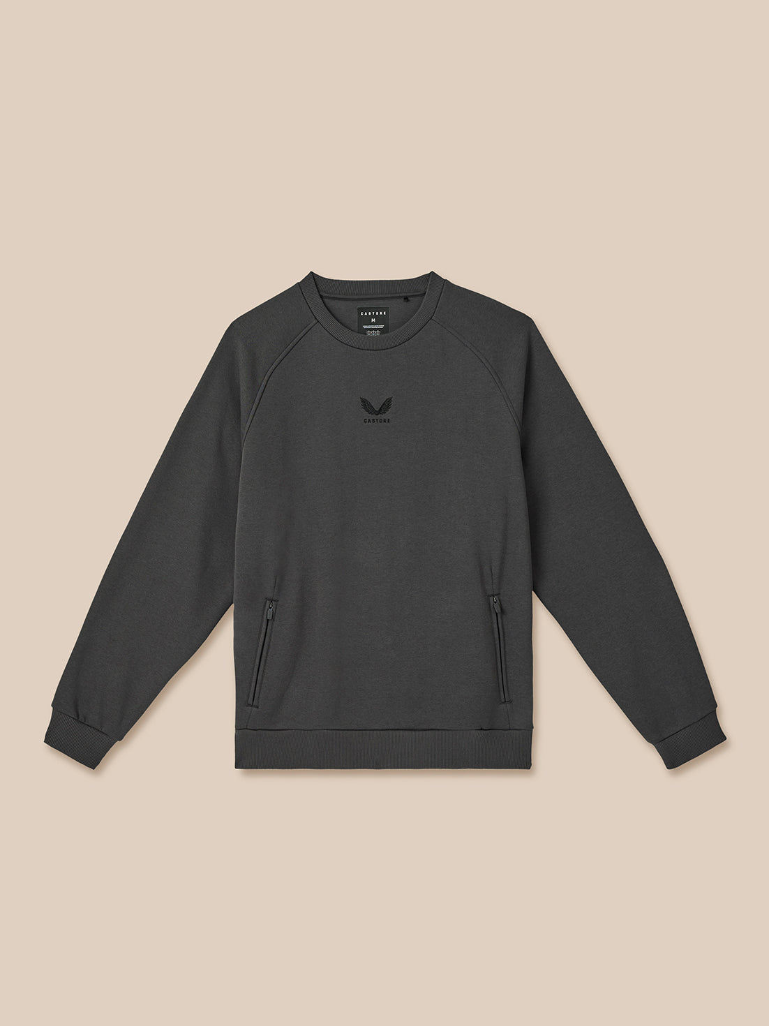 Dark gray sweatshirt with a logo on a beige background