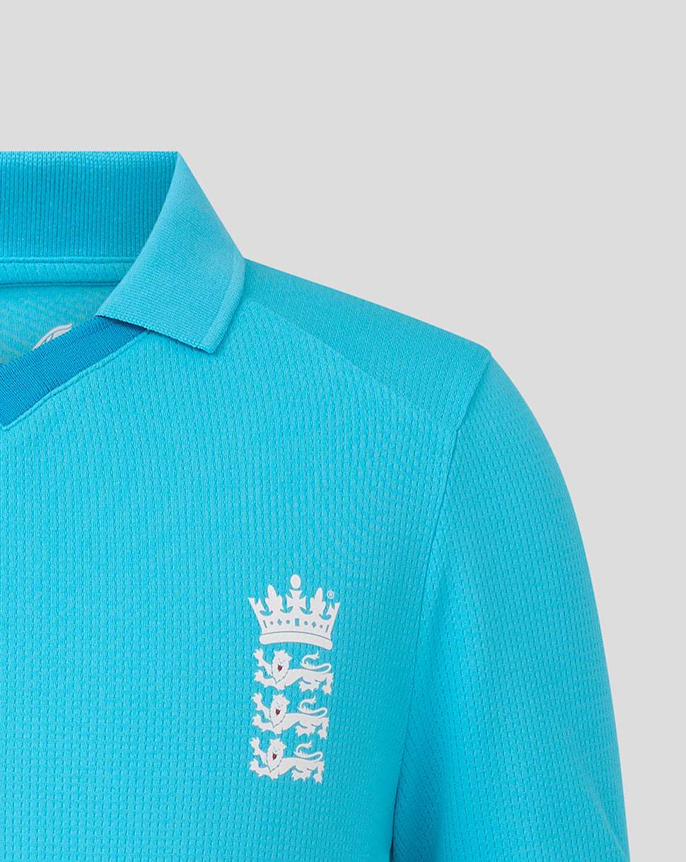 Blue polo shirt with a white logo on a light gray background