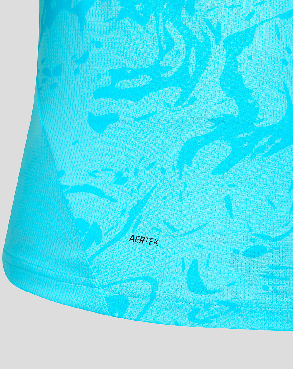 Close-up of a blue athletic top with abstract pattern and 'AERTEK' branding.