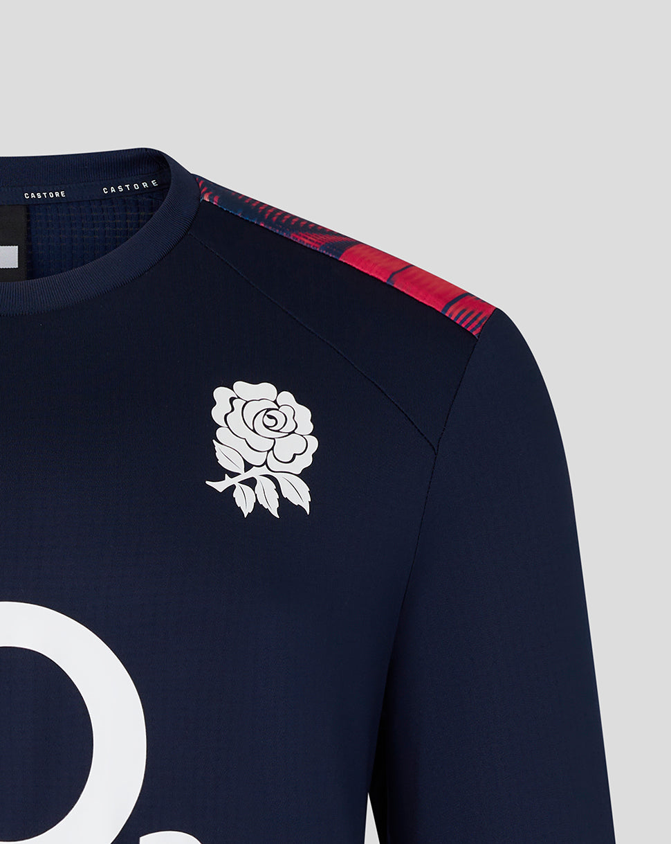 Navy sports jersey with white rose emblem and red pattern on sleeve against a light gray background