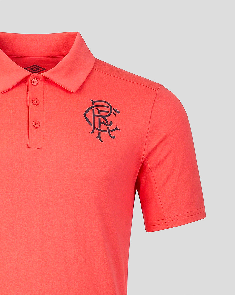 Red polo shirt with a black logo on a light gray background