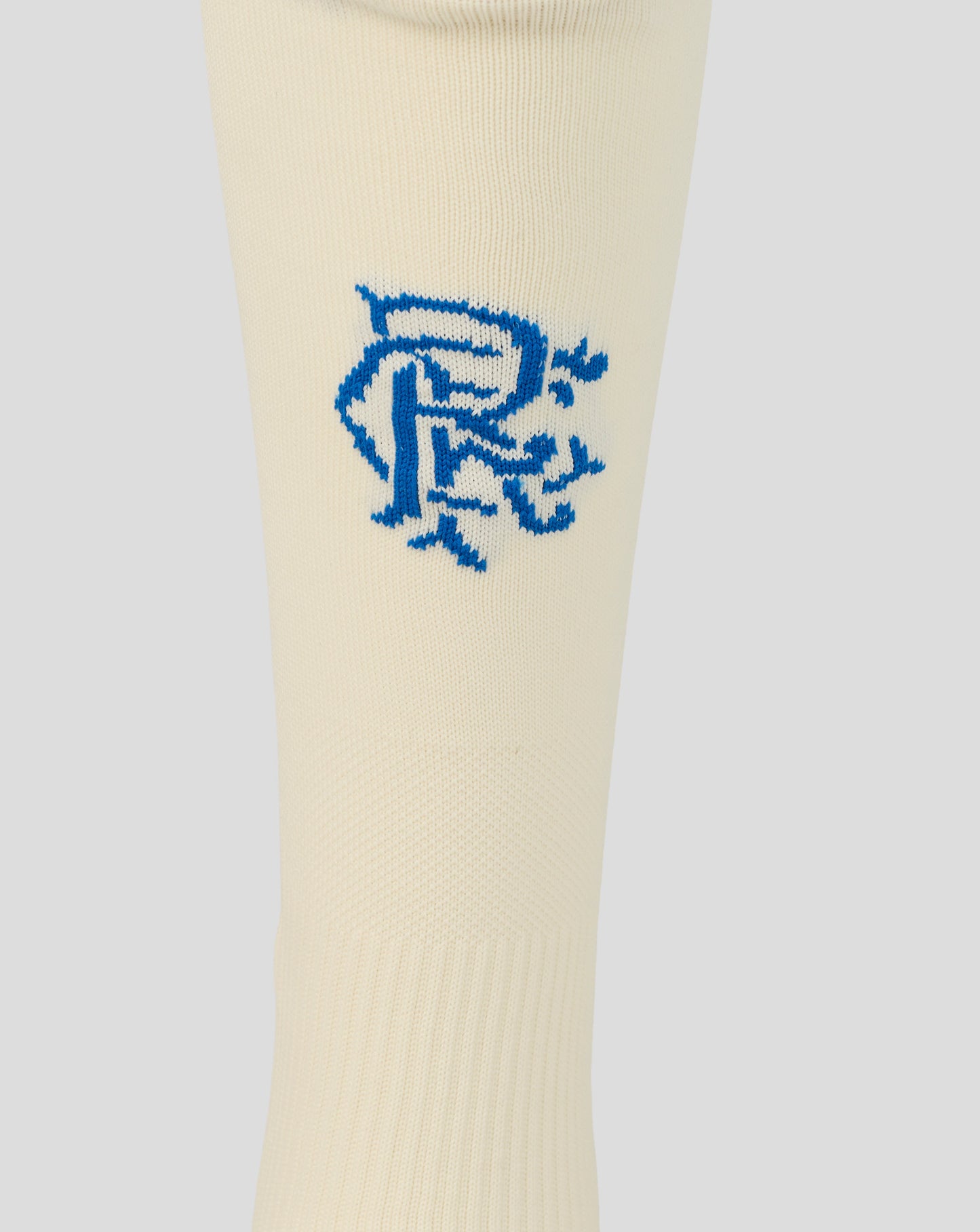 Beige sock with a blue logo on a light gray background