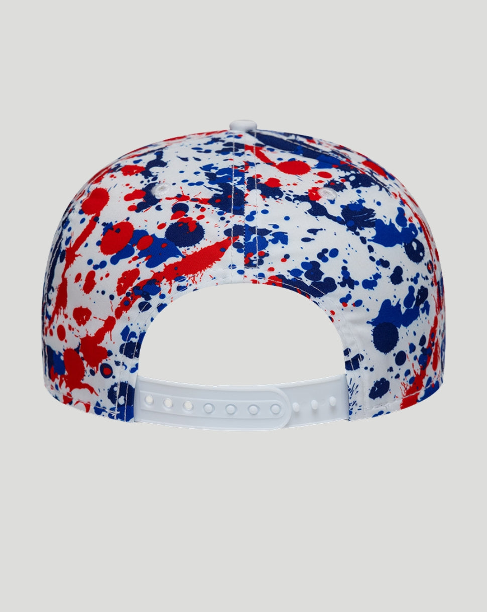 Colorful splatter paint cap on a white background
