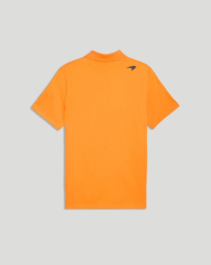 Back view of a papaya McLaren polo showing the small logo on the upper back shoulder