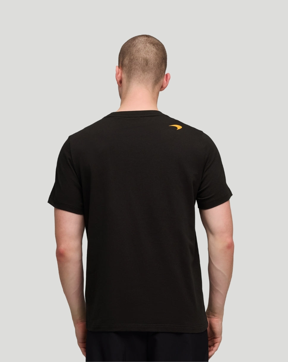 Back view of black McLaren T shirt showing a small orange logo on the upper back