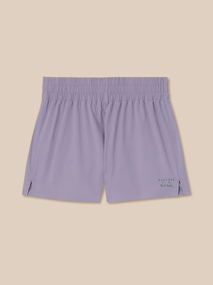 Purple shorts on a beige background