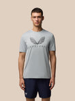 Male model wearing grey Adapt Graphic Training T-Shirt with Castore wings logo on the chest.
