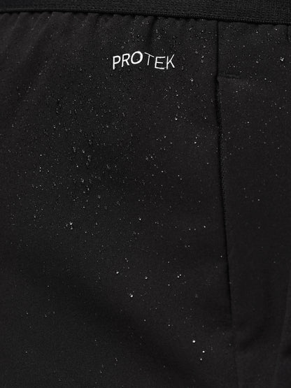 Black fabric with 'PROTEK' branding on a textured surface
