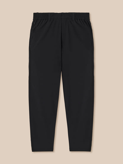 Black pants on a beige background