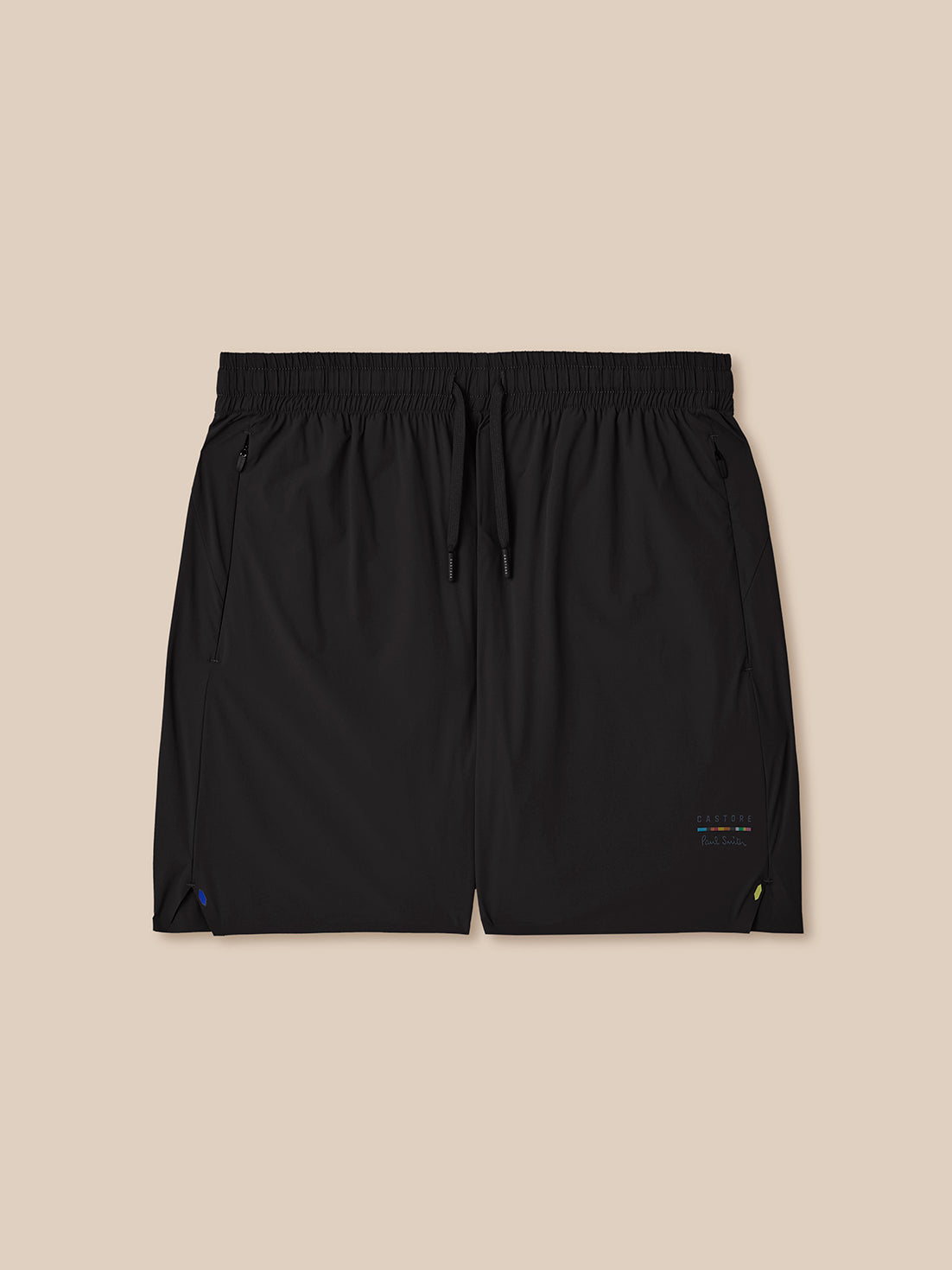 Black shorts on a beige background