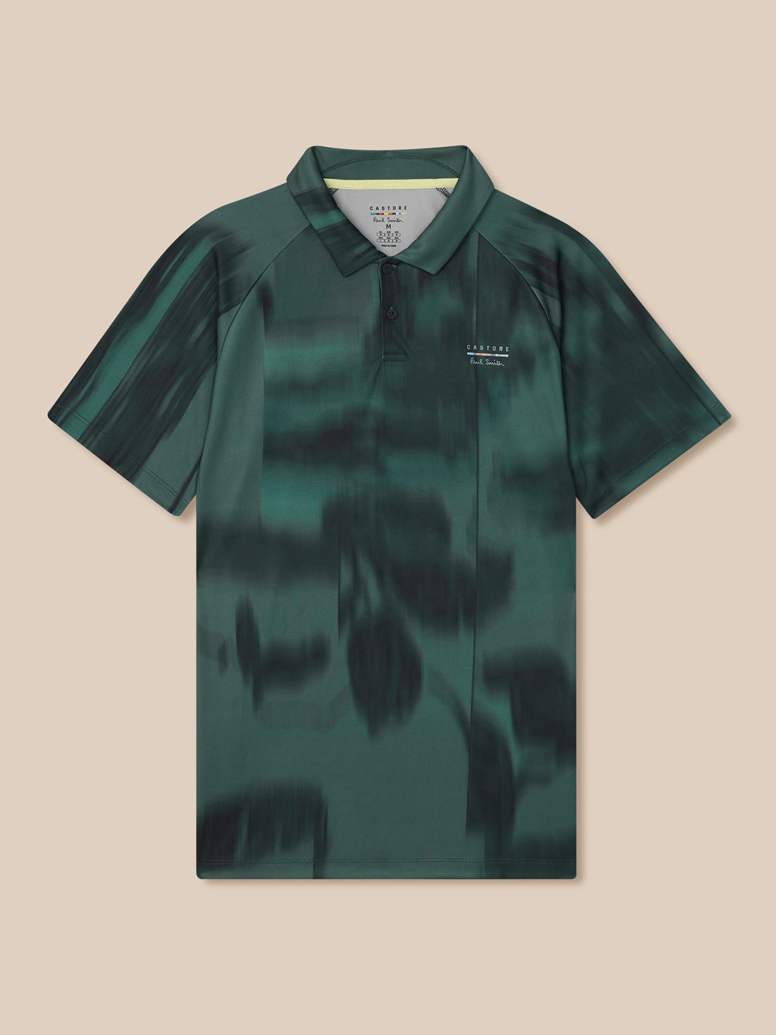 Green camouflage polo shirt on a beige background