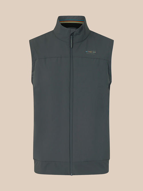 A dark gray sleeveless zip-up vest with a stand-up collar, shown flat against a solid beige background. A small embroidered logo is visible on the left chest.