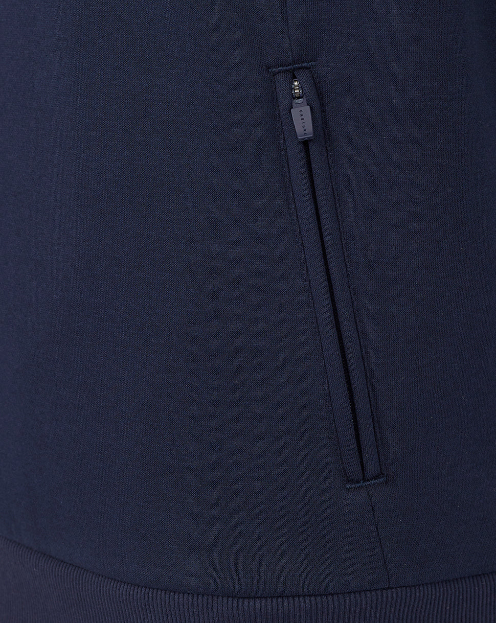 Navy blue fabric with a zipper detail on a dark background