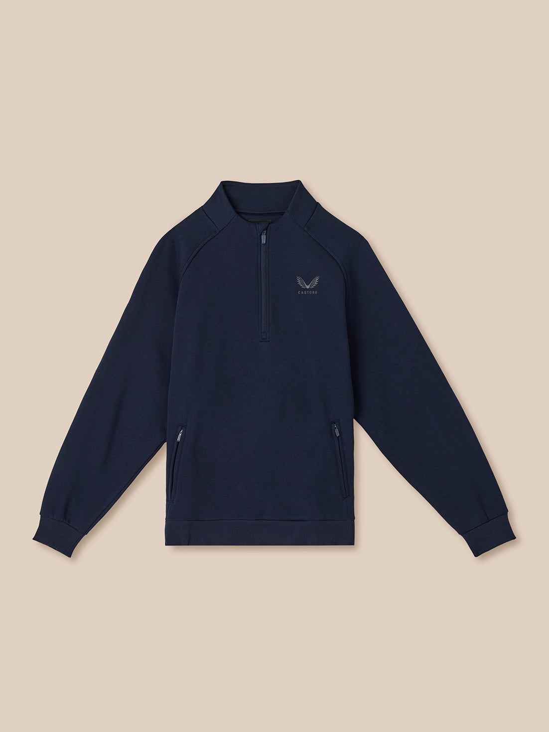 Navy blue pullover with a logo on a beige background