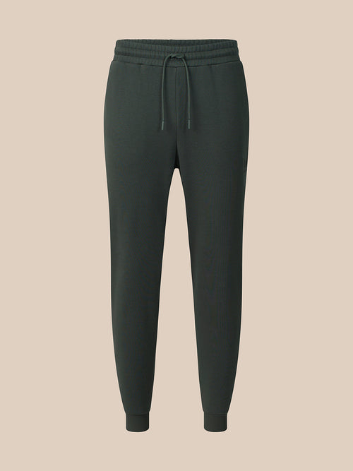Dark green cargo pants on a white background