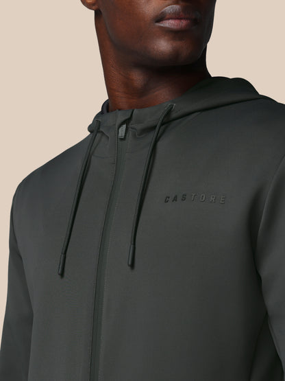 Dark gray hoodie with brand logo on a neutral background