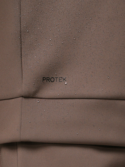 Brown fabric with 'PROTEK' branding and water droplets.