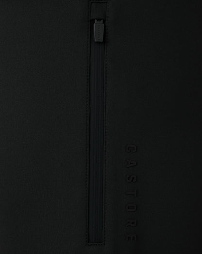 Black jacket with a zipper and 'Castore' branding on a black background