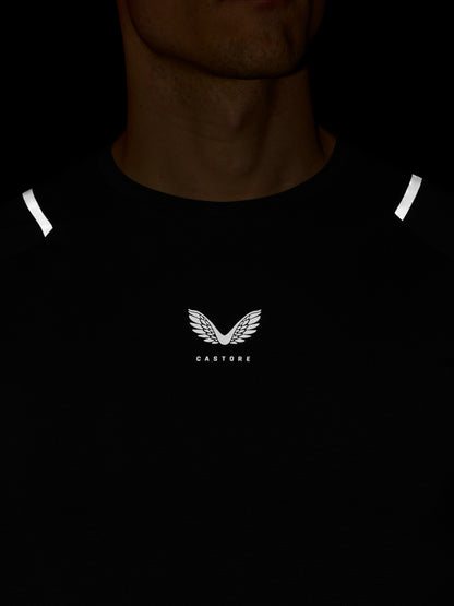 Black t-shirt with a logo and text on a dark background
