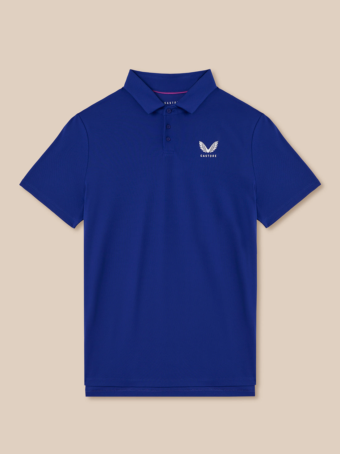 Blue polo shirt with a logo on a beige background