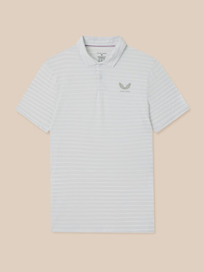 Light blue striped polo shirt with a logo on a beige background