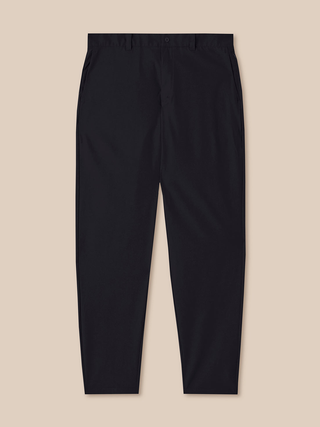 Black pants on a beige background
