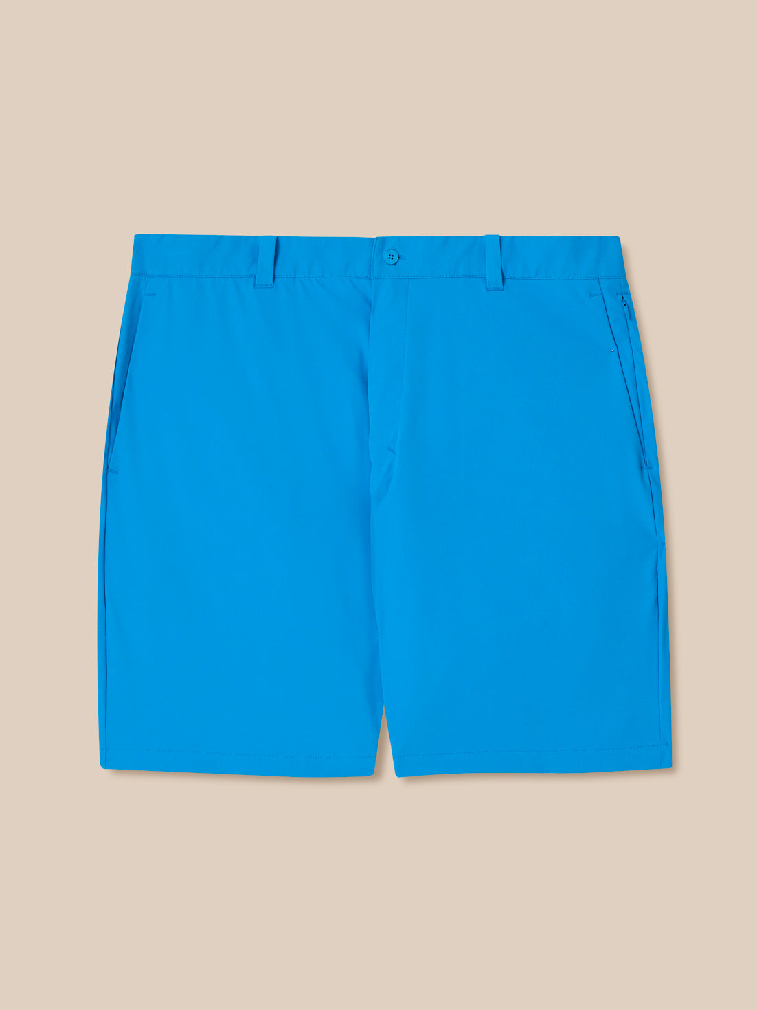 Blue shorts on a beige background