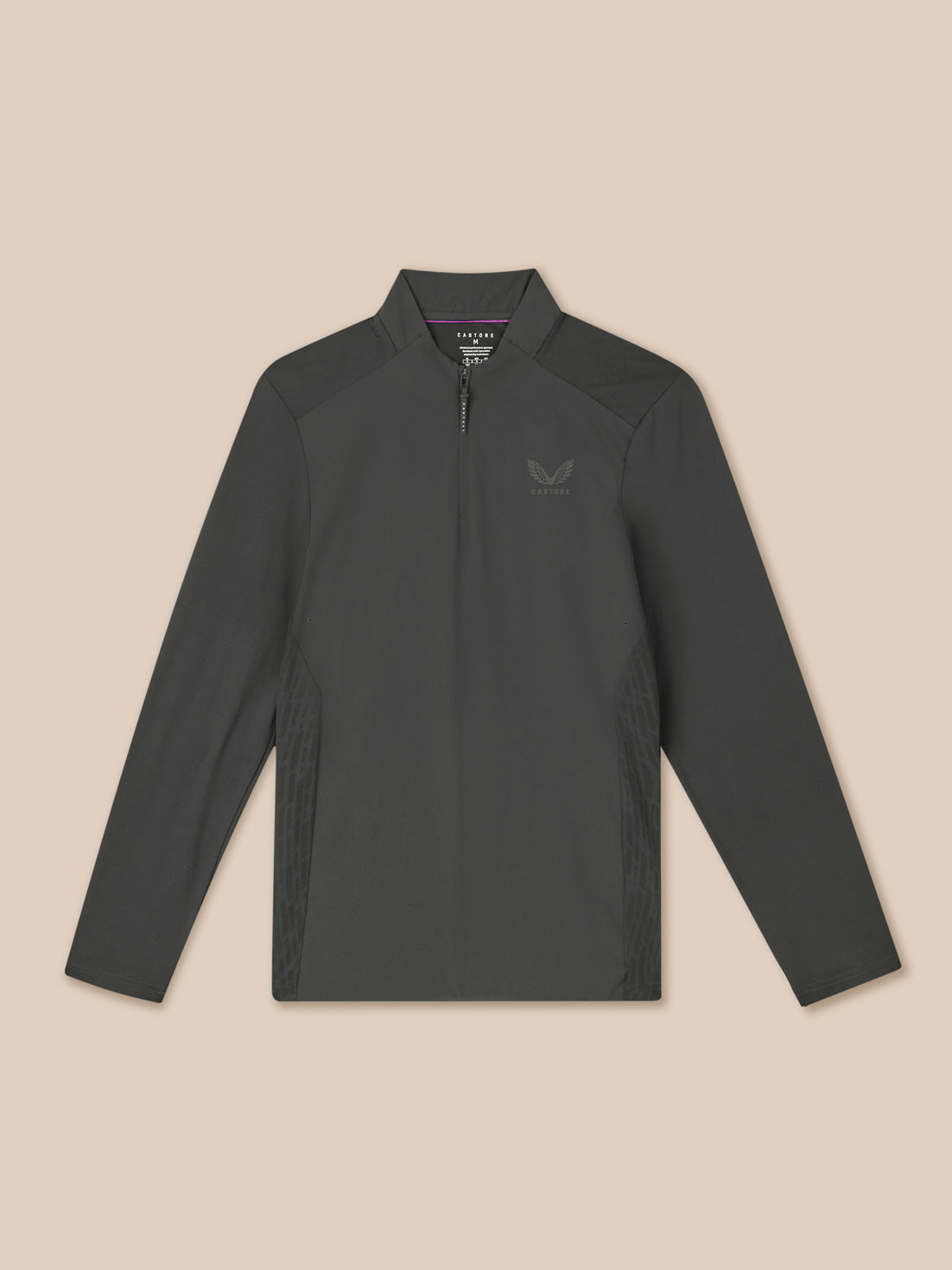 Dark gray long-sleeve shirt with a quarter zip on a beige background