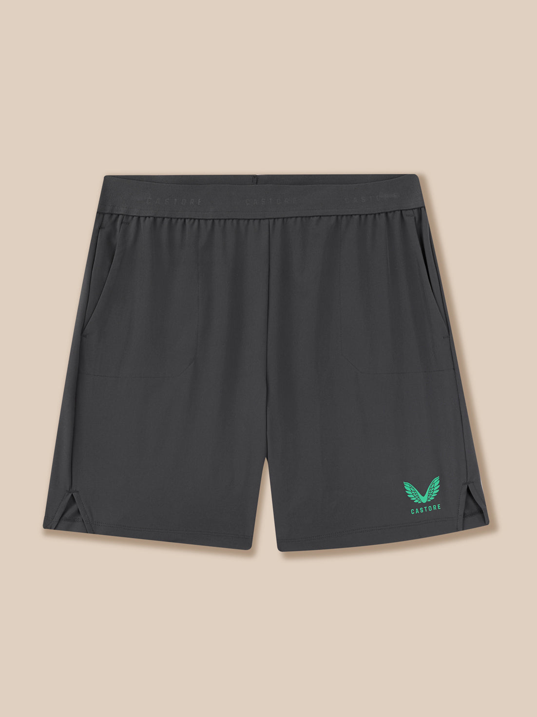 Black shorts with a logo on a beige background