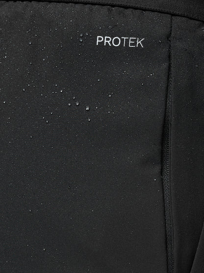 Black fabric with 'PROTEK' branding on a close-up shot