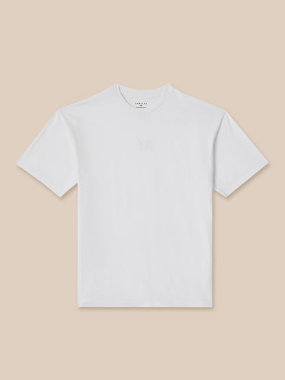 White t-shirt on a beige background
