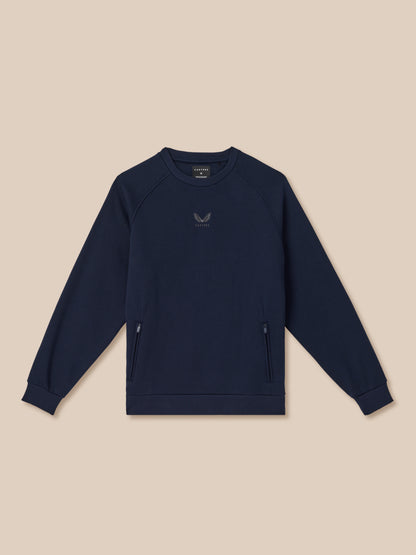 Navy blue sweatshirt with a logo on a beige background
