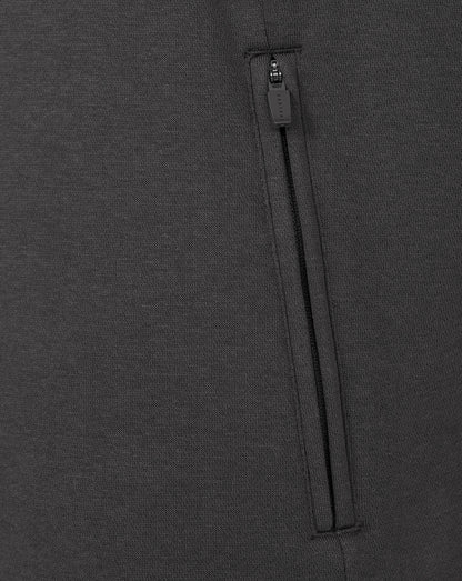 Close-up of a zipper on a dark gray fabric background