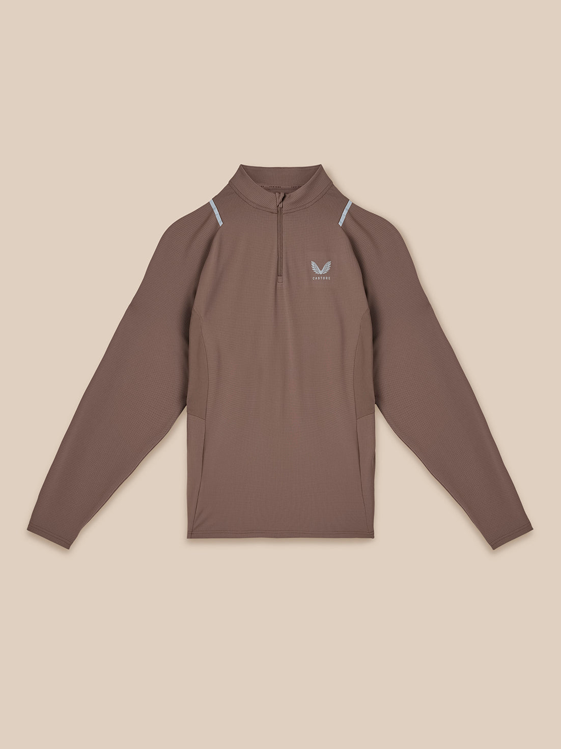 Brown long-sleeve shirt with a logo on a beige background