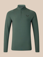 A dark green long-sleeve quarter-zip athletic top with a small wing logo on the left chest, displayed on a neutral beige background.