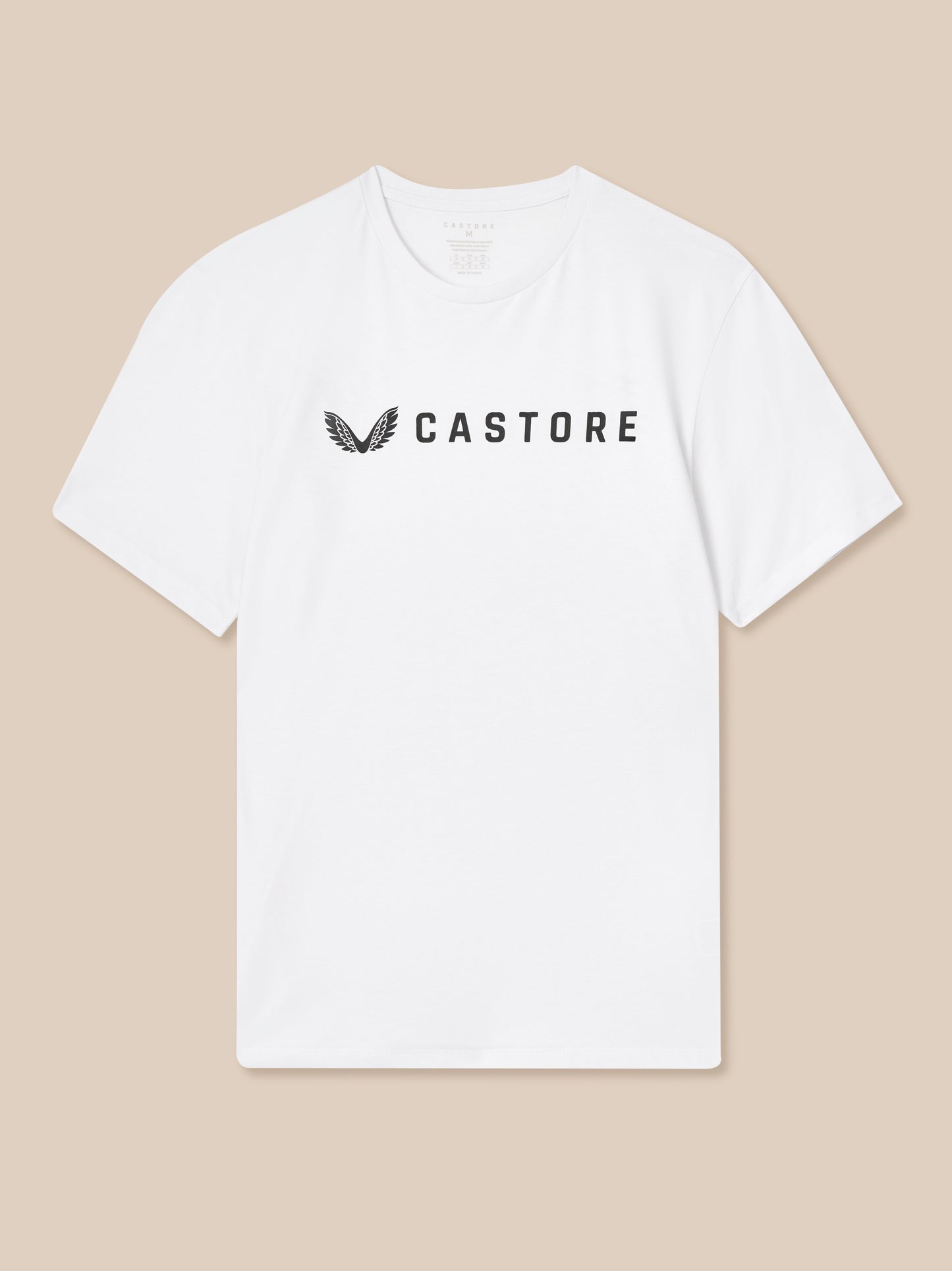 White t-shirt with 'CASTORE' logo on a beige background