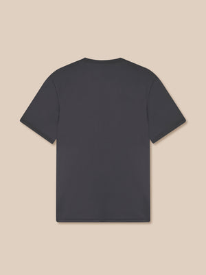 Black t-shirt on a beige background