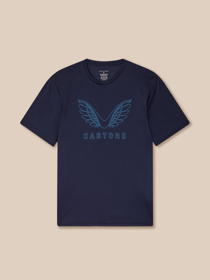 Navy t-shirt with 'Castore' logo on a beige background