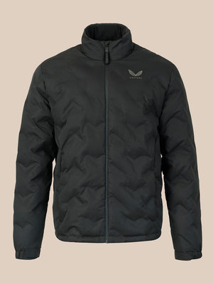 A black quilted zip-up jacket with a stand-up collar and a subtle gray wing logo on the left chest, displayed against a solid beige background.
