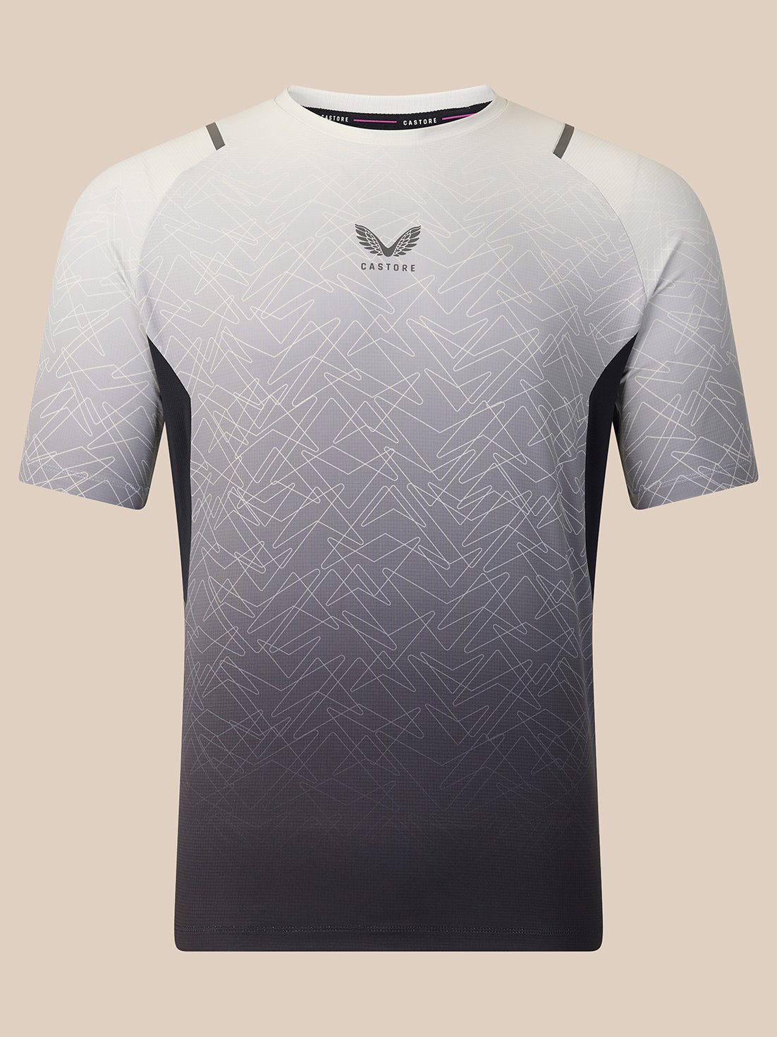A short-sleeve athletic t-shirt with a white-to-black gradient and a subtle geometric line pattern. The brand logo 'Castore' is visible on the center chest, and 'Castore' is printed on the inner neck label.