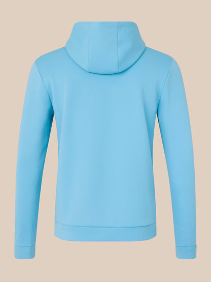 Light blue hoodie on a beige background