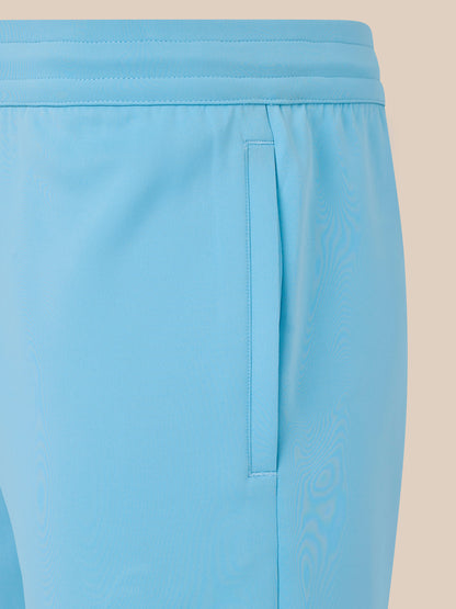 Light blue shorts with a beige background