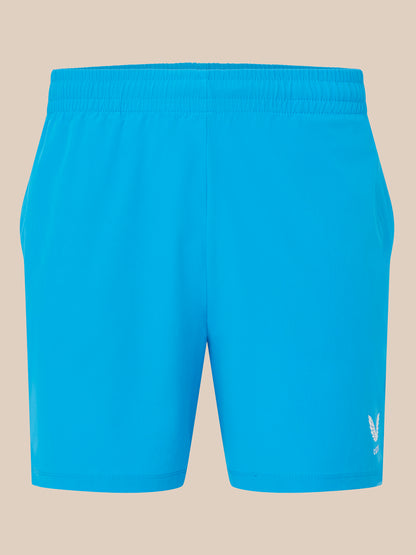 Blue shorts with a logo on a beige background