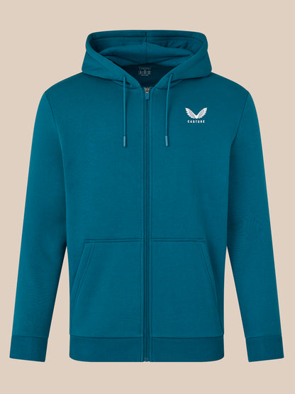 Blue hoodie with a logo on a beige background