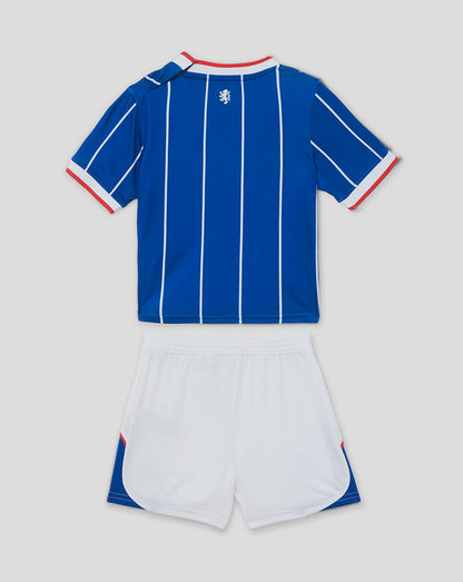 Blue and white sports outfit with red accents on a light gray background